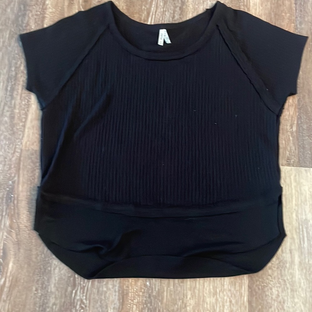 Plain black blouse.